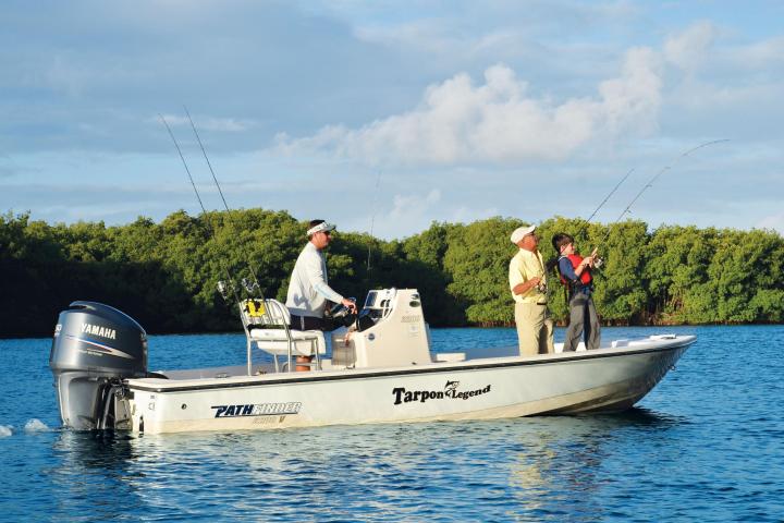 a group of people on a boat in the water